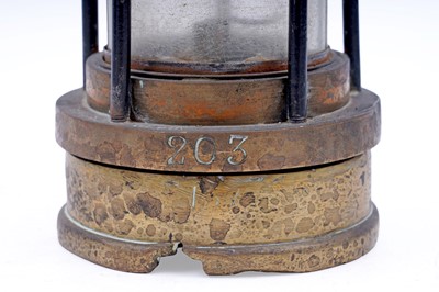 Lot 197 - A collection of four ‘Protector’ type lamps