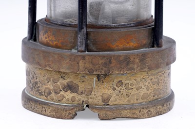 Lot 197 - A collection of four ‘Protector’ type lamps