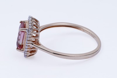 Lot 28 - A contemporary blush tourmaline and diamond ring