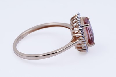 Lot 28 - A contemporary blush tourmaline and diamond ring
