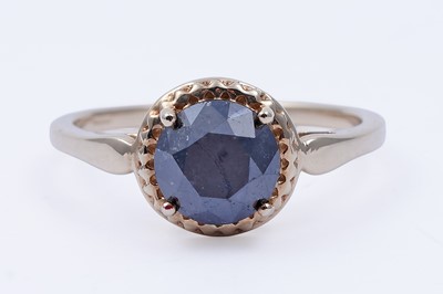 Lot 29 - A single stone black diamond ring