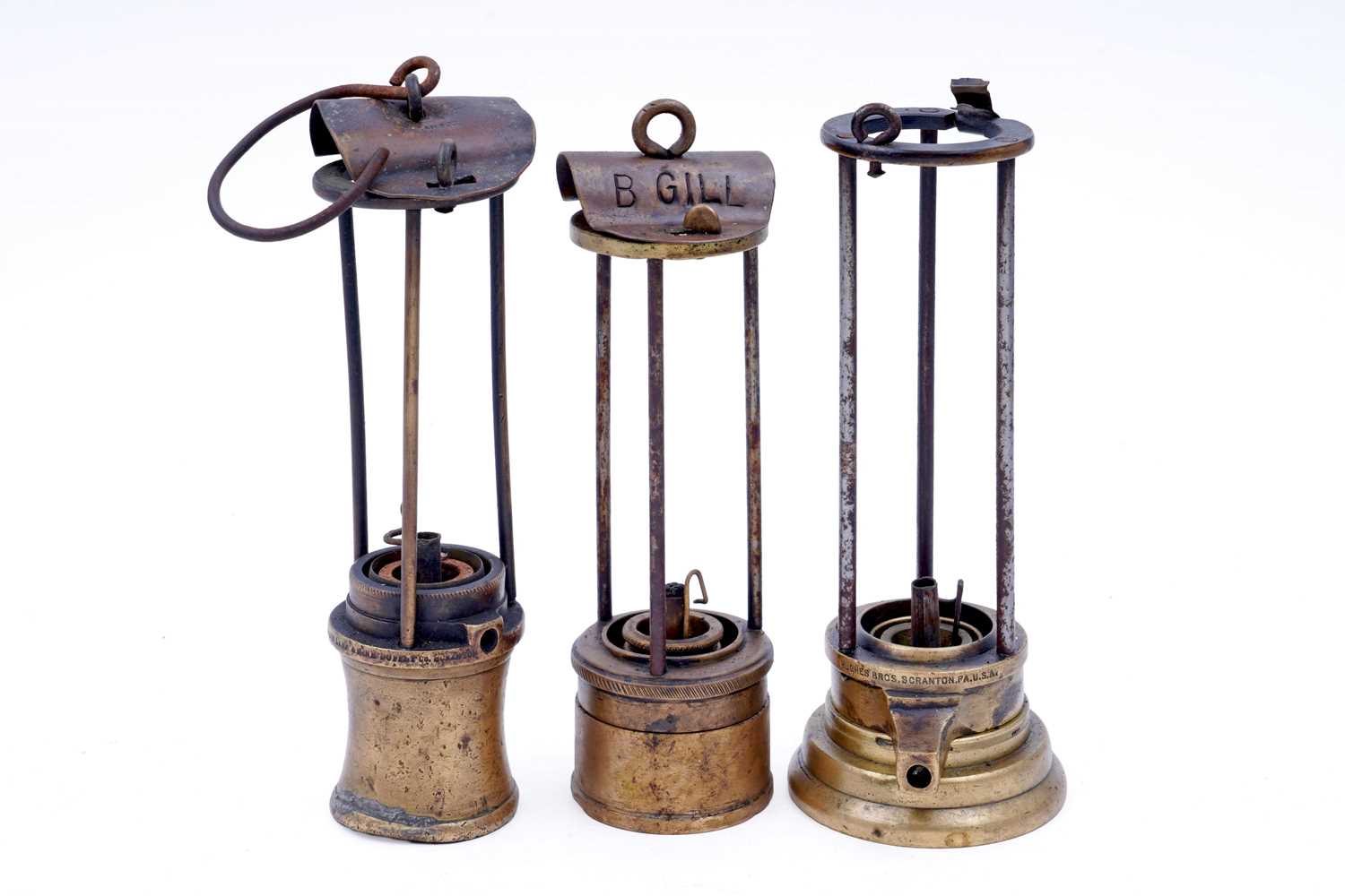 Lot 241 - A collection of three part ‘Davy’ type lamps
