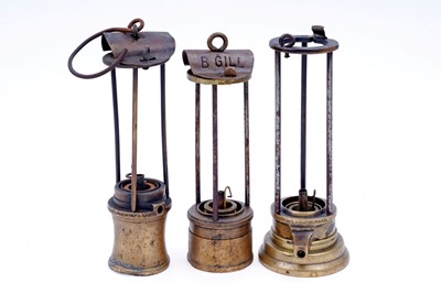 Lot 241 - A collection of three part ‘Davy’ type lamps