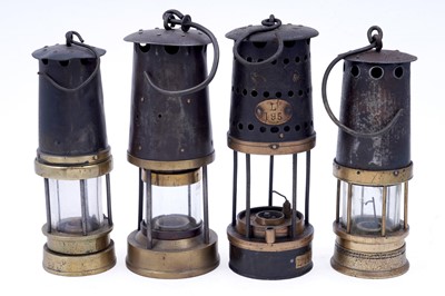 Lot 269 - A collection of four ‘Protector’ type lamps