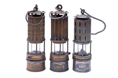 Lot 179 - Two Wolf ‘Corrugated’ safety lamps; and one other