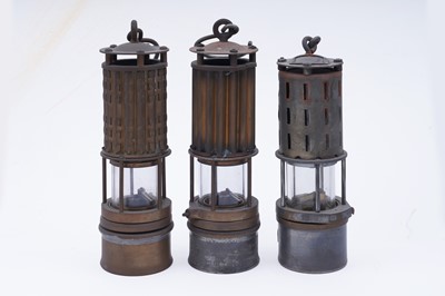 Lot 179 - Two Wolf ‘Corrugated’ safety lamps; and one other