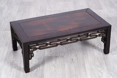 Lot 43 - A Chinese hardwood coffee table