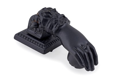 Lot 299 - A French cast iron door knocker and rest