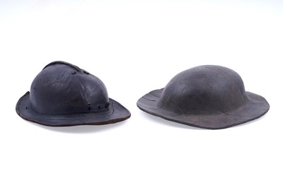 Lot 168 - Two 19th Century formed leather miners' helmets