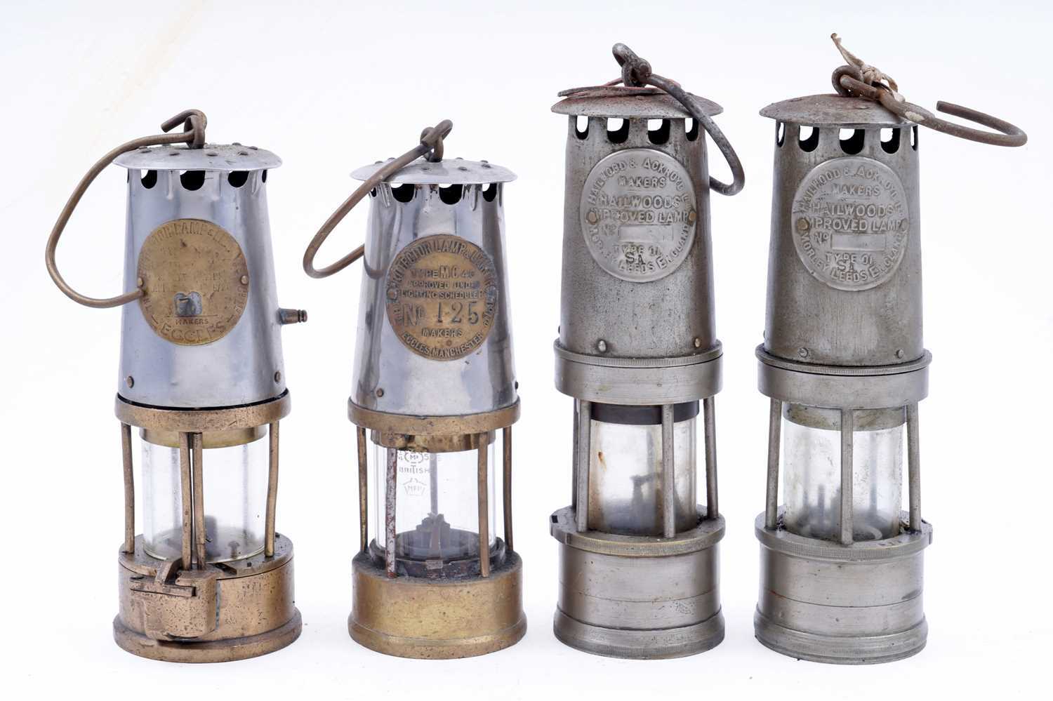 Lot 170 - Two 'Eccles Type’ lamps; and two ‘Hailwoods Improved' lamps