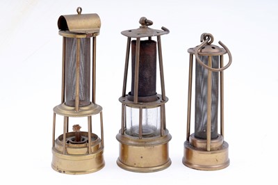 Lot 228 - Three reproduction or presentation lamps
