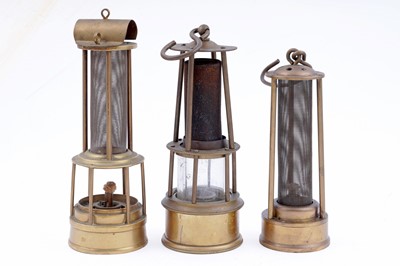 Lot 228 - Three reproduction or presentation lamps