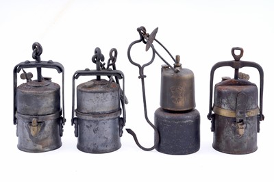 Lot 151 - Four carbide lamps