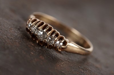 Lot An Edwardian five stone diamond ring