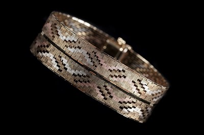 Lot A 1970s 9ct tri-coloured gold woven bracelet