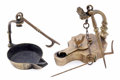 Lot 268 - A 19th Century ‘Frog’ type lamp; and a reproduction brass oil lamp