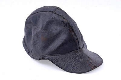 Lot 160 - A 19th Century stitched leather miner's peaked cap