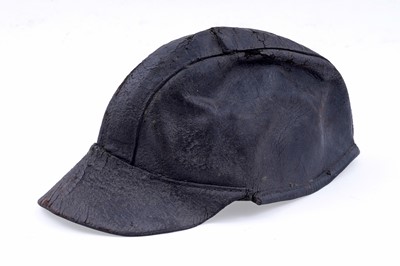 Lot 160 - A 19th Century stitched leather miner's peaked cap