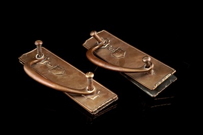 Lot 209 - A pair of first half 20th Century brass door handles
