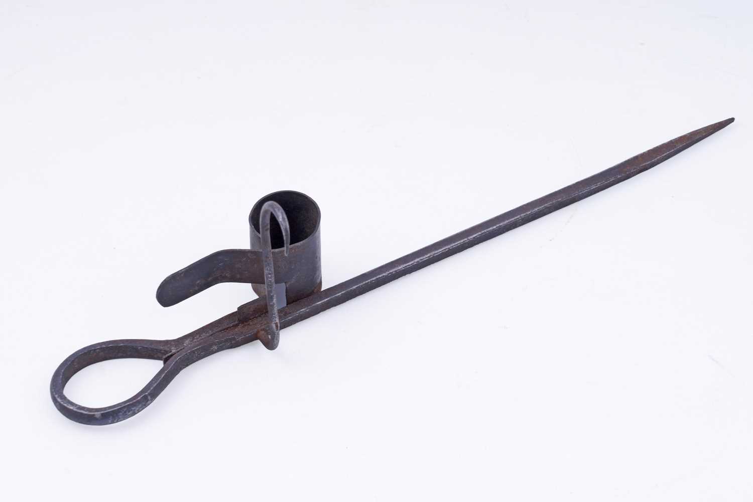 Lot 230 - A wrought iron miner's candle holder or ‘Sticking Tommy’