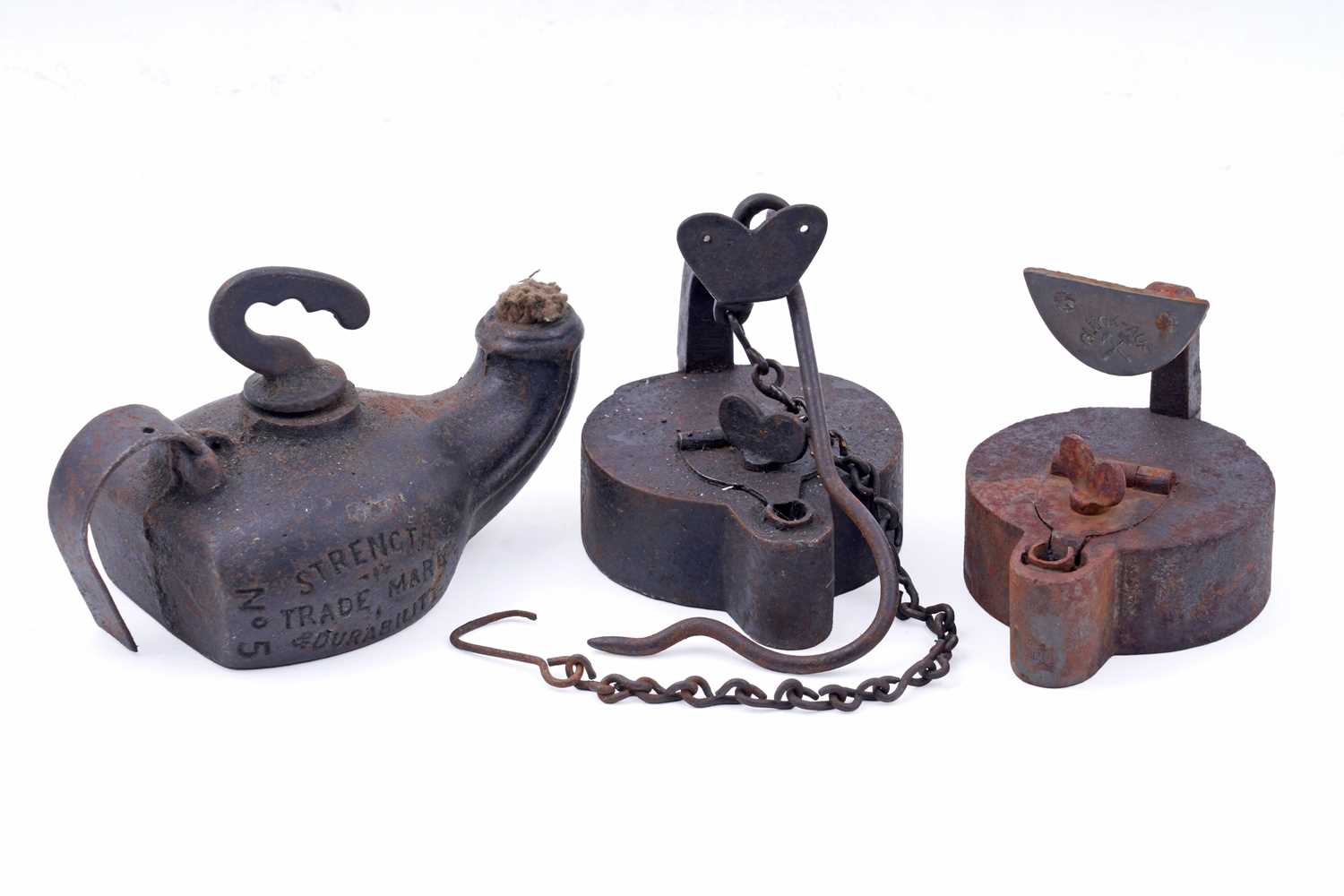 Lot 201 - Two 19th Century Continental ‘Frog’ type miners’ lamps; and a cast iron
