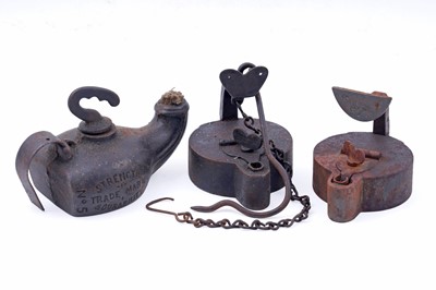 Lot 201 - Two 19th Century Continental ‘Frog’ type miners’ lamps; and a cast iron