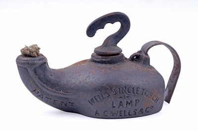 Lot 201 - Two 19th Century Continental ‘Frog’ type miners’ lamps; and a cast iron