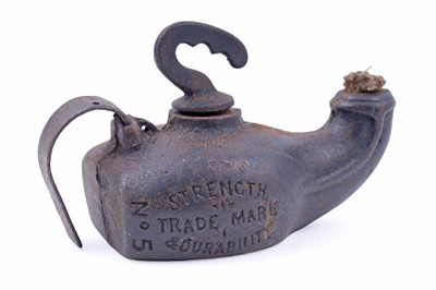 Lot 201 - Two 19th Century Continental ‘Frog’ type miners’ lamps; and a cast iron