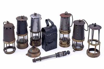 Lot 248 - A collection of miners lamps and lamp parts