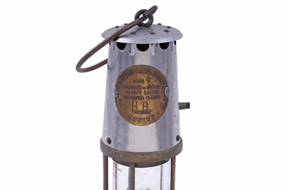 Lot 248 - A collection of miners lamps and lamp parts
