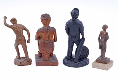Lot 245 - Four figural studies of miners; and a selection of miniature or presentation miner’s lamps