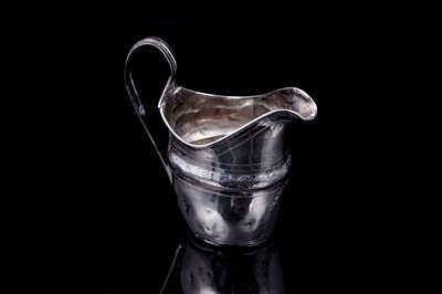Lot 184 - A Georgian Newcastle silver cream jug