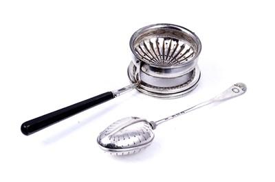 Lot 207 - A Victorian silver patented "Teaette" tea infuser spoon; and a gimballed tea strainer