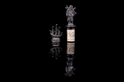 Lot 140 - A 1930s silver novelty wine bottle stopper; and a WMF bottle stopper modelled as a night watchman