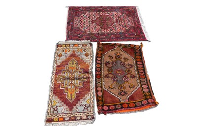 Lot 142 - A collection of three 20th Century rugs