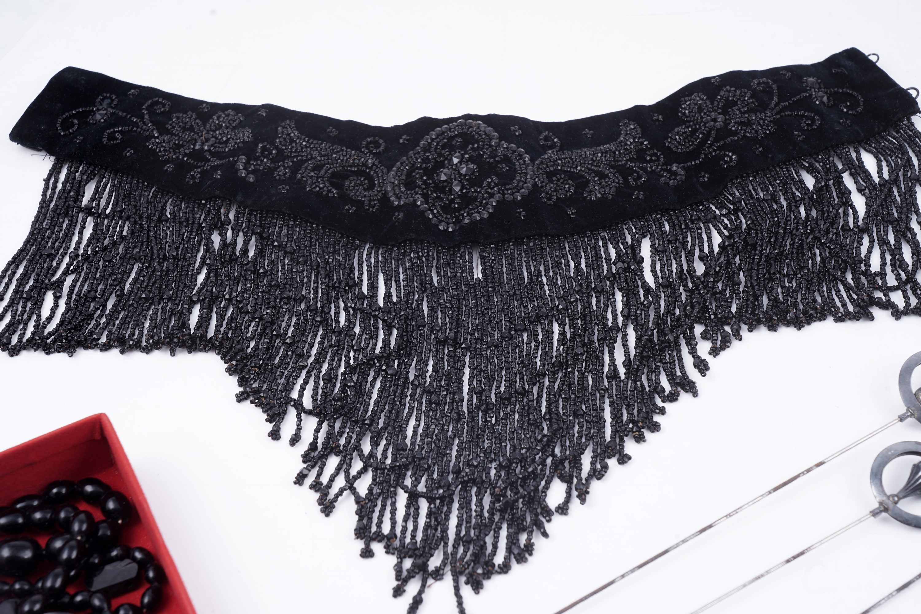 Collared Land Lot 663 - An Edwardian lady's jet beaded velvet collar