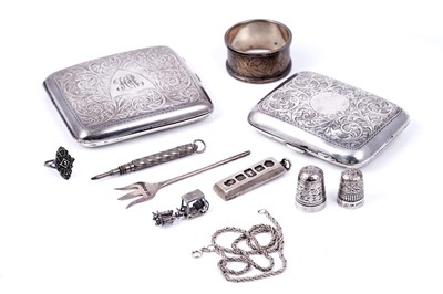 Lot 186 - Silver items including two cigarette cases and a marcasite ring