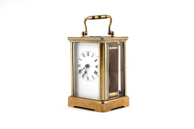 Lot 162 - An early 20th Century brass 30-hour carriage timepiece