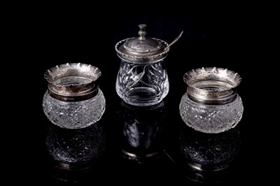 Lot 143 - An Elizabeth II preserve jar with spoon; and a pair of Edwardian thistle pattern jars