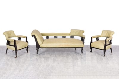 Lot 67 - An early 20th Century ebonized chaise longue; and a pair of Edwardian tub armchairs