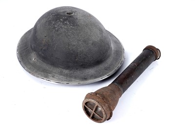 Lot 205 - A British ‘Brodie’ helmet; and a ‘Mines Department Safety Torch’