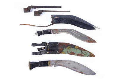 Lot 210 - Two bayonets; and two kukris