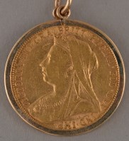 Lot 595 - A Victorian gold sovereign, 1900, in 9ct....