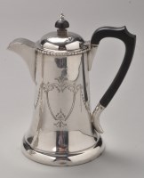 Lot 707 - An Edwardian hot water jug, by J. Deakin &...