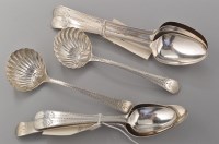 Lot 737 - Three George III silver table spoons and three...