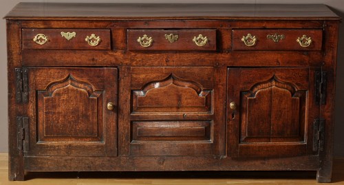 Lot 1263 - An 18th Century oak dresser base, fitted three...