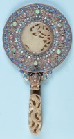 Lot 193 - A Chinese carved jade, enamel decorated white...