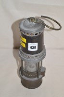 Lot 439 - A steel miner's lamp, by E. Thomas & Williams...