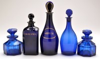 Lot 305 - Two Georgian blue glass decanters, of mallet...
