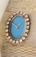 Lot 682 - A 9ct. white gold and diamond set bracelet...
